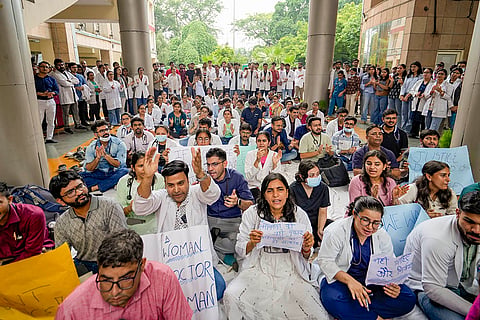 Medics stage a protest at Ram Manohar Lohia Hospital, in New Delhi